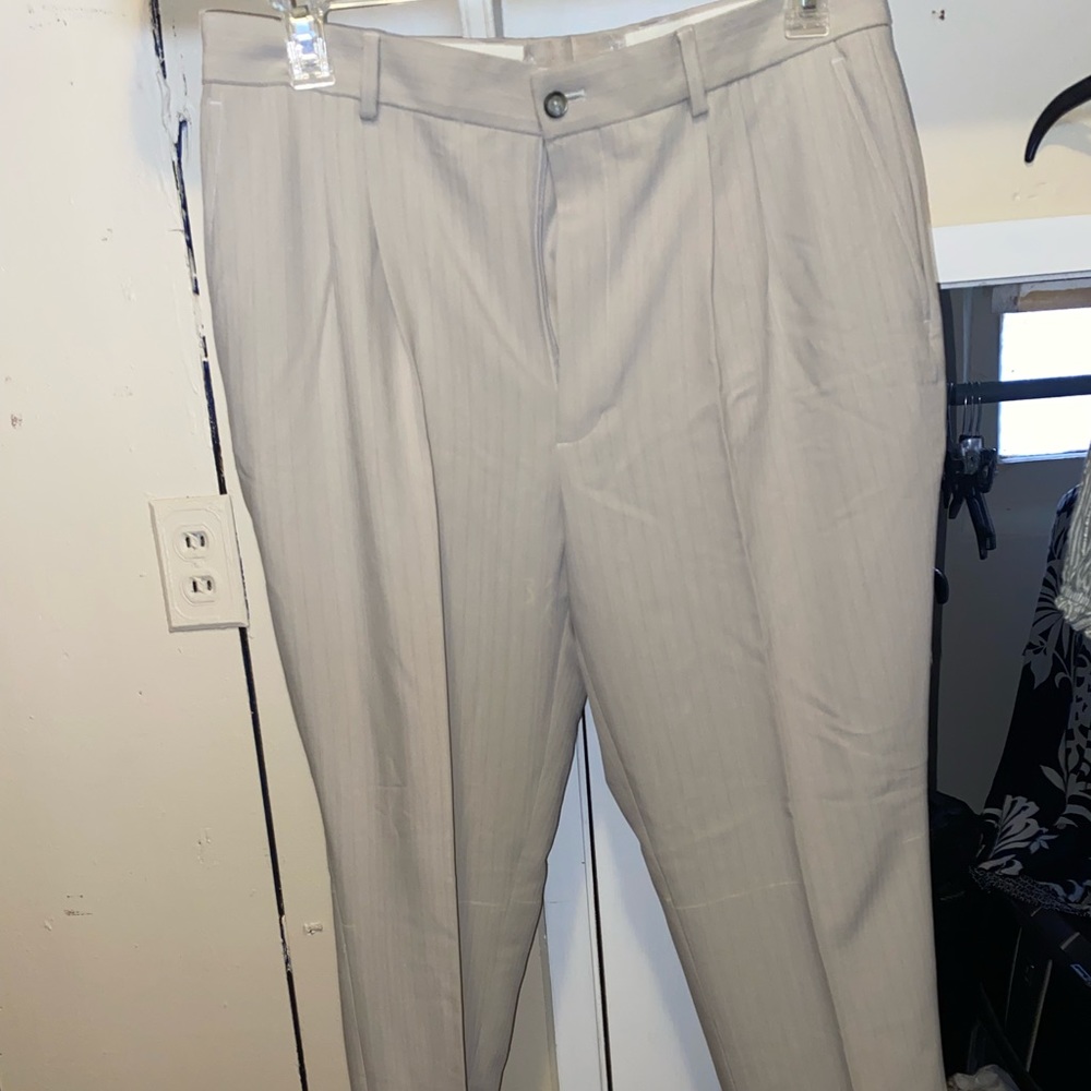 Men dress suit pants. Size 36x30, brand Claiborne, light tan/crème color